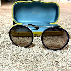Gucci Round glasses. Blue and gold